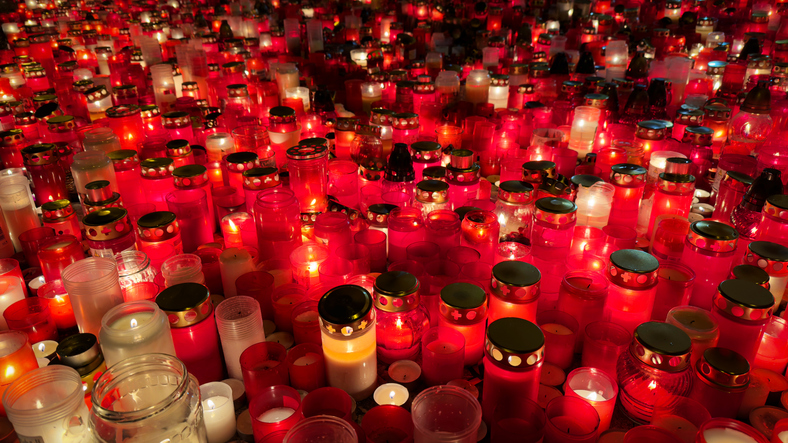 flaming red candles , a place of reverence